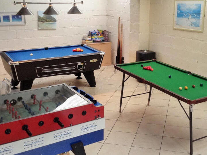 Views towards the cottage with enclosed patio area.