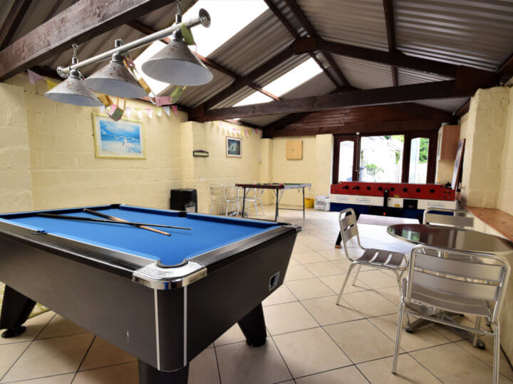 Views towards the cottage with enclosed patio area.