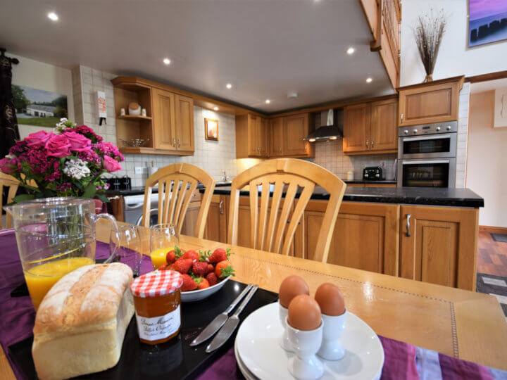 Views towards the cottage with enclosed patio area.