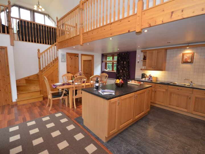 Views towards the cottage with enclosed patio area.