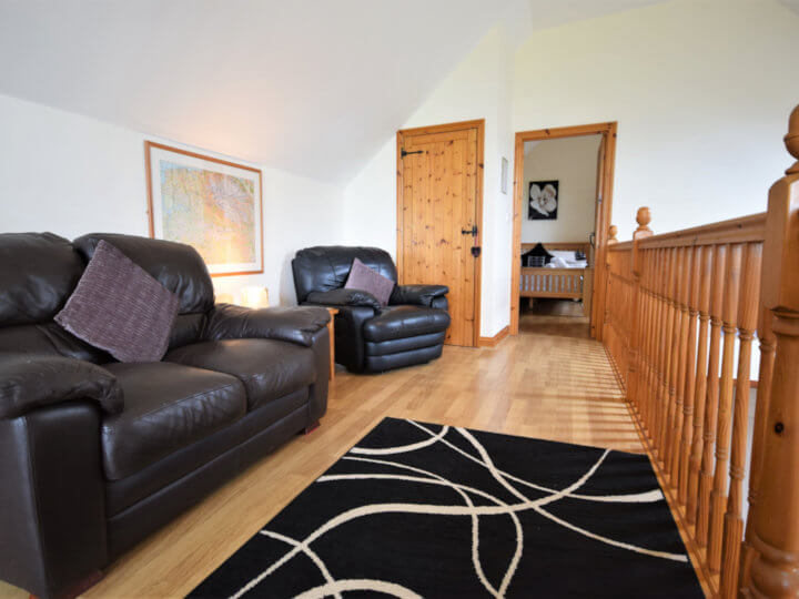 Views towards the cottage with enclosed patio area.