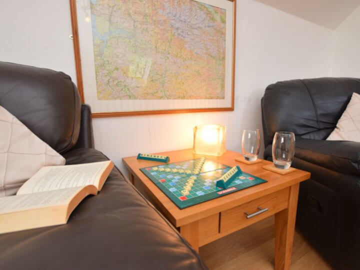 Views towards the cottage with enclosed patio area.